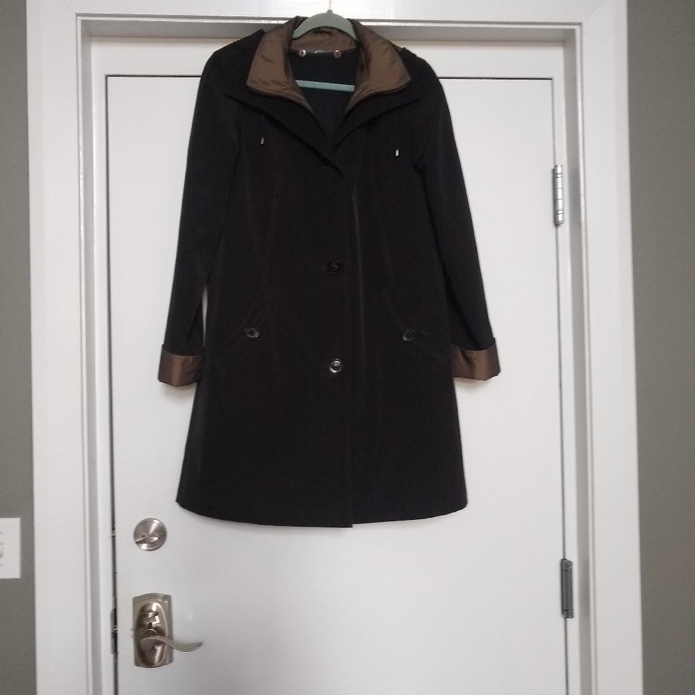 Gallery all weather raincoat with removable hood and lining.